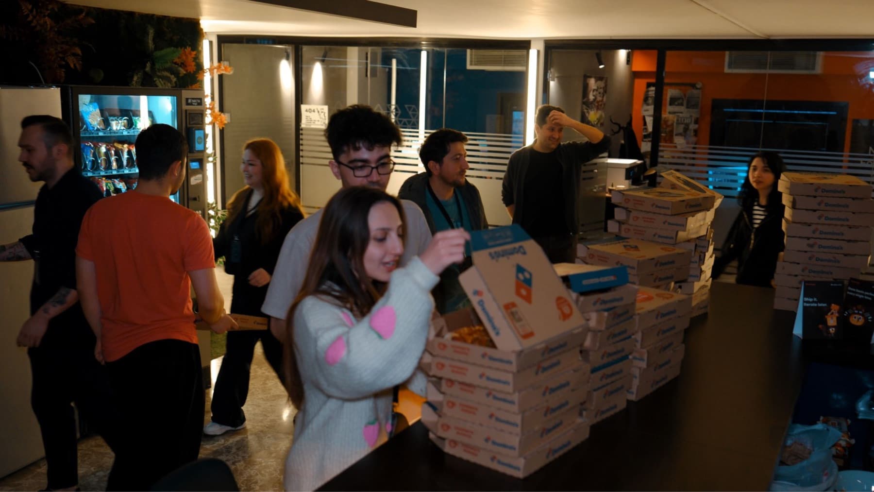 Pizza boxes stacked at the entrance of the Neon Apps office during the App Founders New Year Party in Istanbul, December 2025