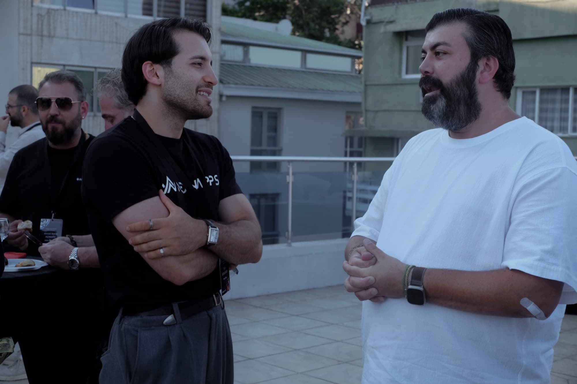 Tyler Blackford talking with a founder at the finale
