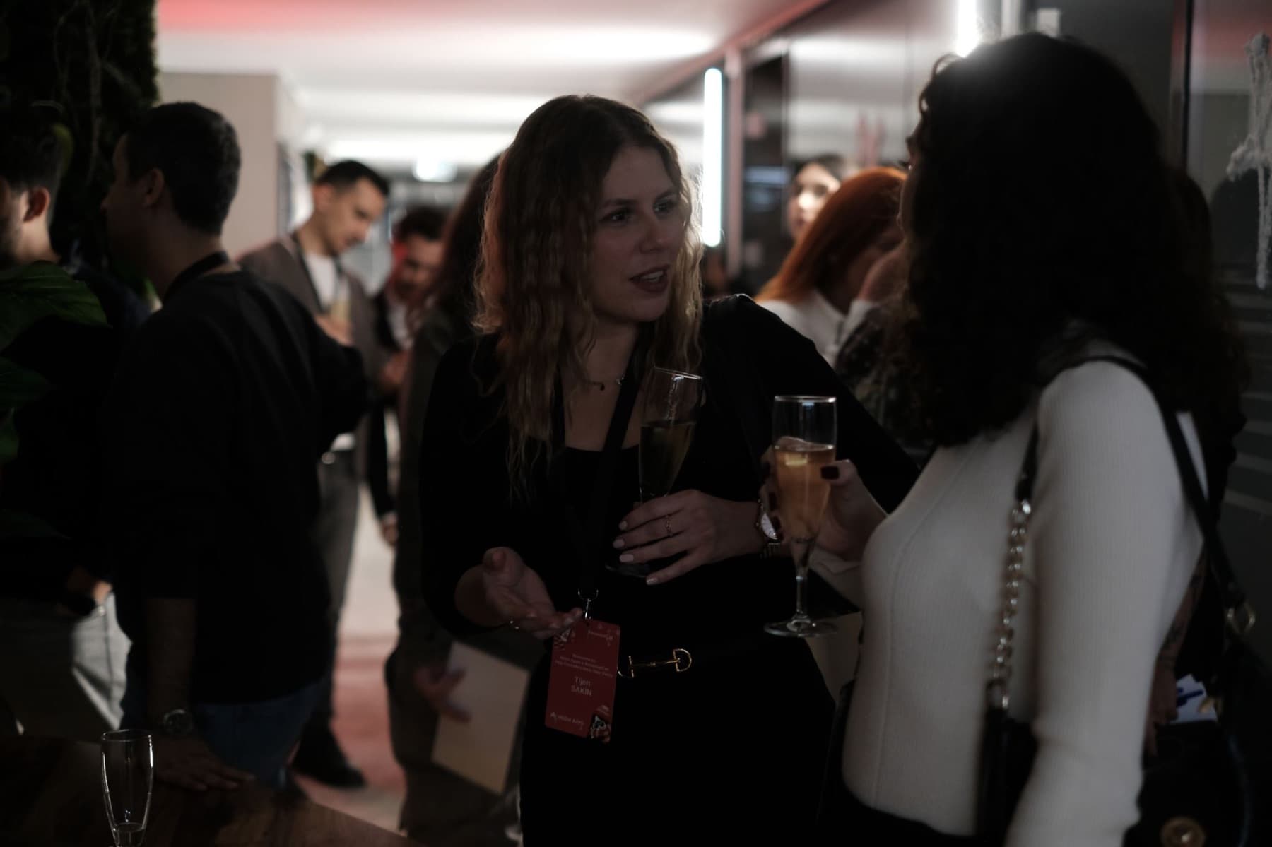 Two founders in conversation at the App Founders New Year Party in the Neon Apps office in Istanbul, December 2025