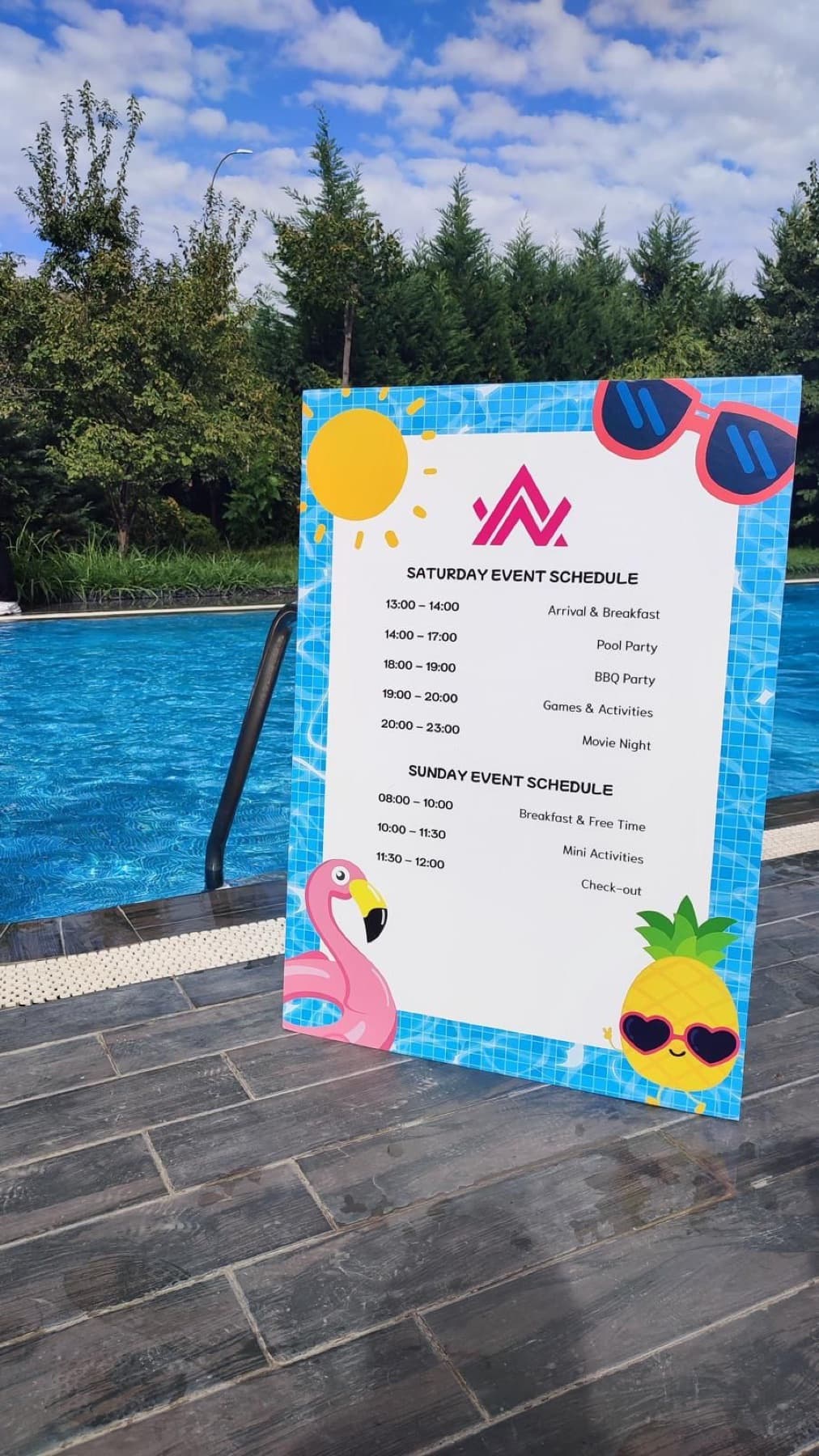 The schedule board beside the pool at the Neon Apps summer party